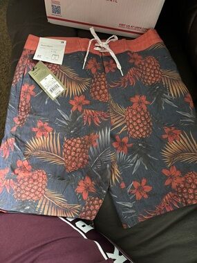 Men's Tropical Pineapple Swim Trunks in Coral and Navy